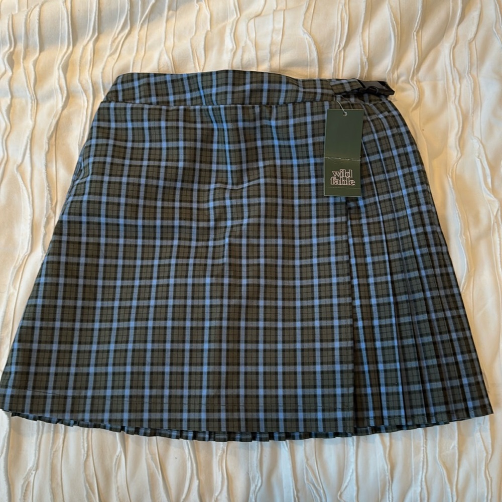 Pleated plaid mini skirt
